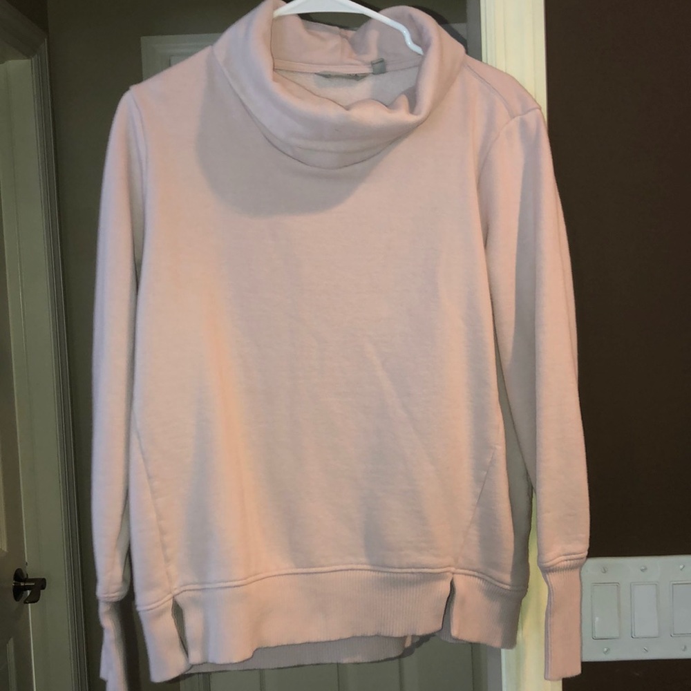 Athlete pink turtleneck sweatshirt